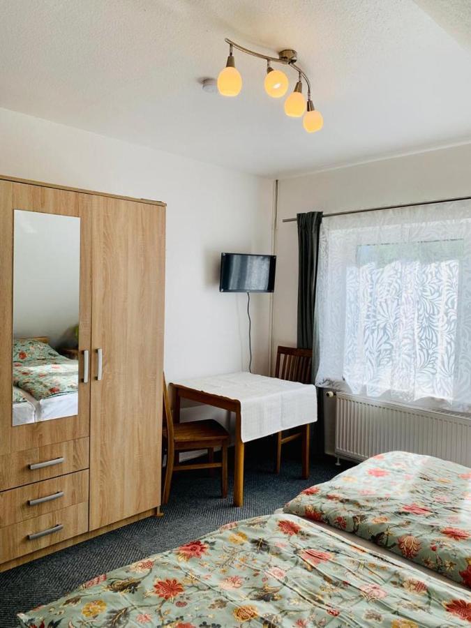 Hotel Pension Schienfatt Am Dornumersieler Tief Esterno foto